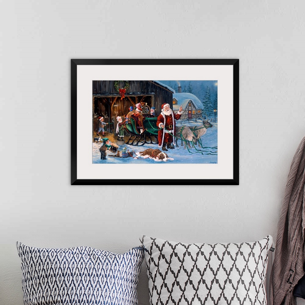 A bohemian room featuring Large, horizontal wall picture of Santa Claus standing in front of his sleigh while elves load it...