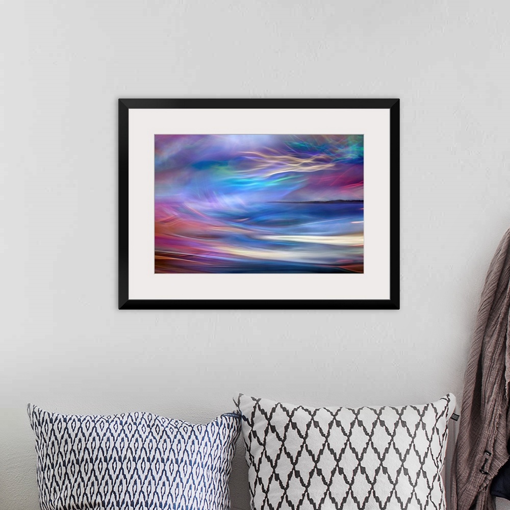 A bohemian room featuring Abstract photograph using time lapsed photography techniques creating indistinct light trails ble...