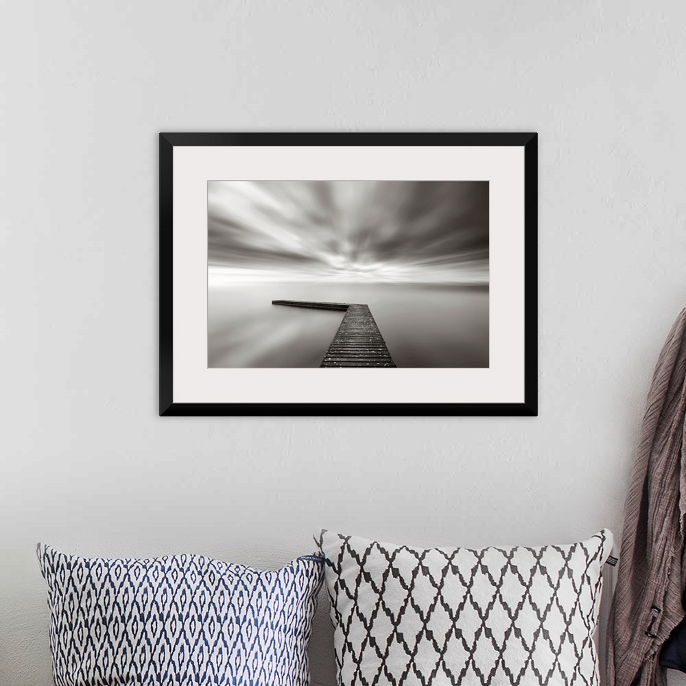 A bohemian room featuring This wall art is a time lapsed photograph of this lake pier has created a sensation of motion in ...