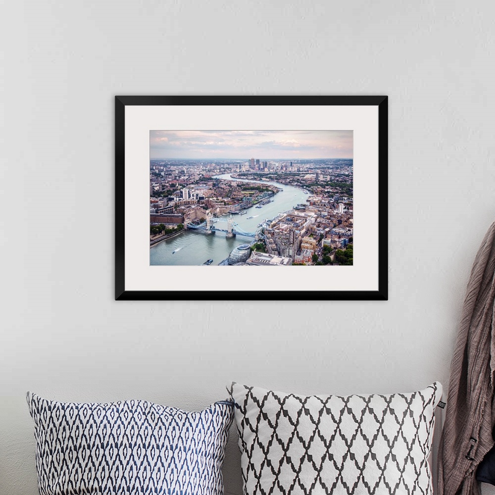 A bohemian room featuring Aerial view of River Thames and Tower Bridge in London, England.