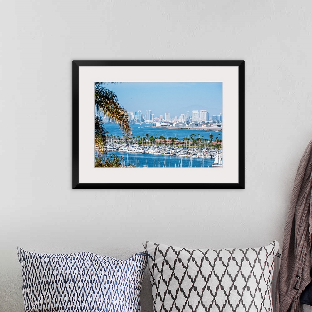 A bohemian room featuring Panoramic photograph of the San Diego, California skyline with a marina in the foreground packed ...
