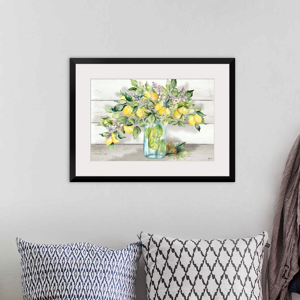 A bohemian room featuring A rustic, country style image of a branch laden with lemons and lemon blossoms, in front of a whi...