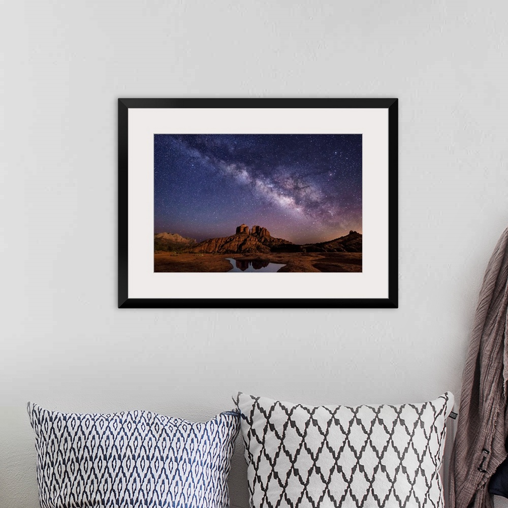 A bohemian room featuring Milky Way and moonlight over Cathedral Rocks in Sedona, Arizona.