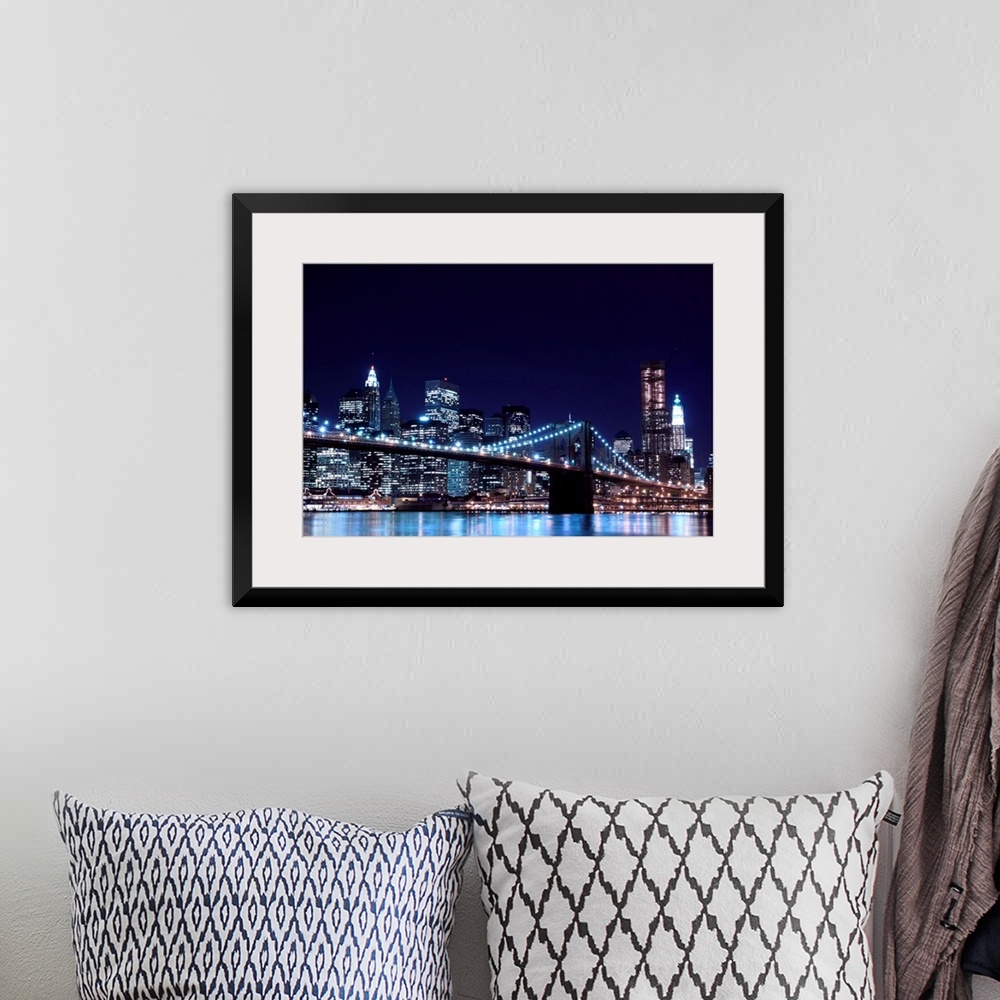 A bohemian room featuring Brooklyn Bridge and Manhattan Skyline At Night, New York City.