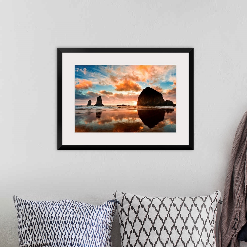 A bohemian room featuring Haystack Rock at sunset, Cannon Beach, Oregon.