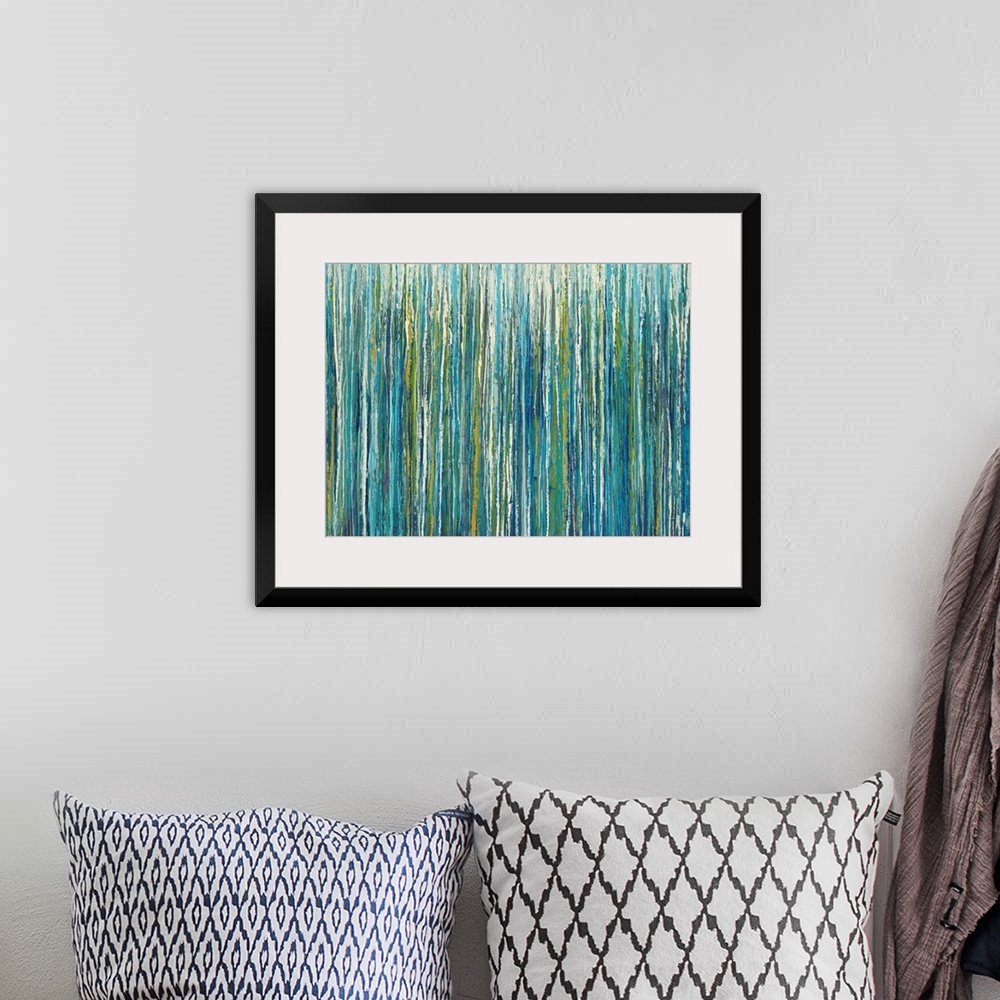 A bohemian room featuring Abstract painting with cool toned vertical lines layered on top and next to one another.