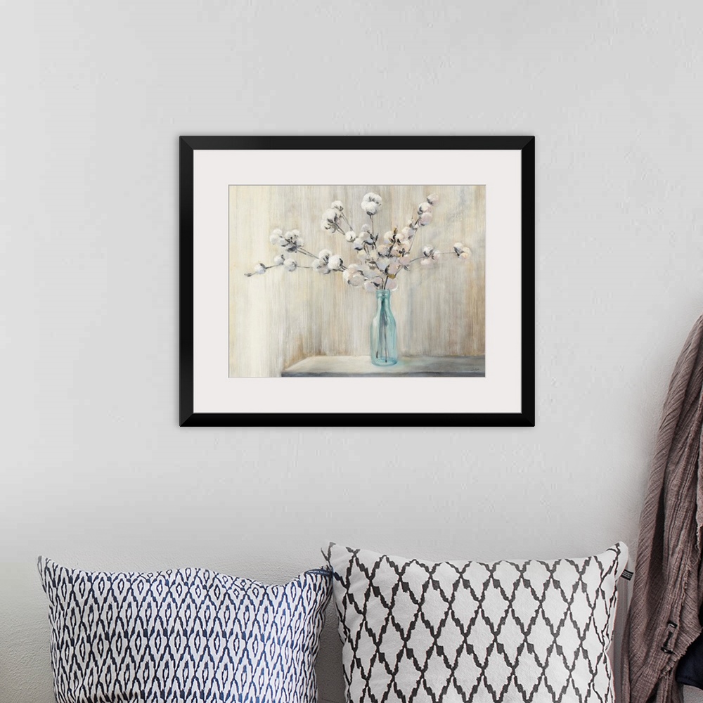 A bohemian room featuring Still life painting of a cotton bouquet in a glass bottle with a neutral colored background.