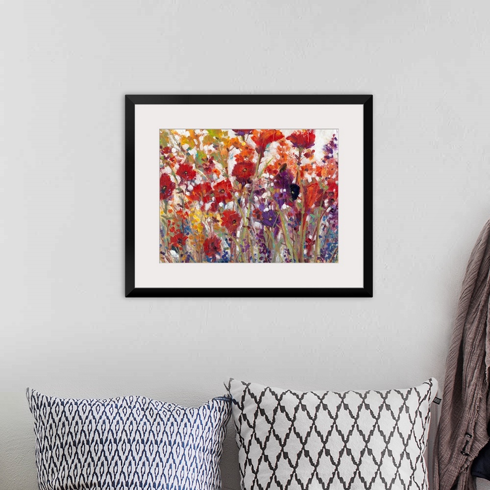 A bohemian room featuring This decorative artwork features sprouting bright wildflowers made from whimsical brush strokes w...
