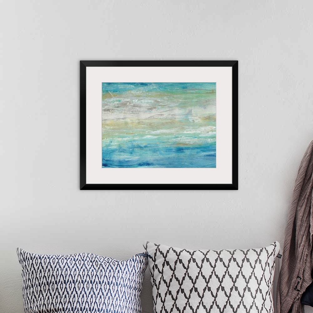 A bohemian room featuring This abstract artwork expresses the turmoil of waves on the ocean by using a ranges of blues and ...