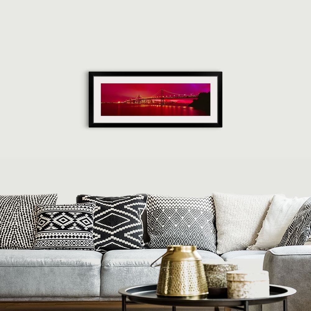 A bohemian room featuring This panoramic landscape photograph was taken at just time of day to turn the sky a brilliant hot...