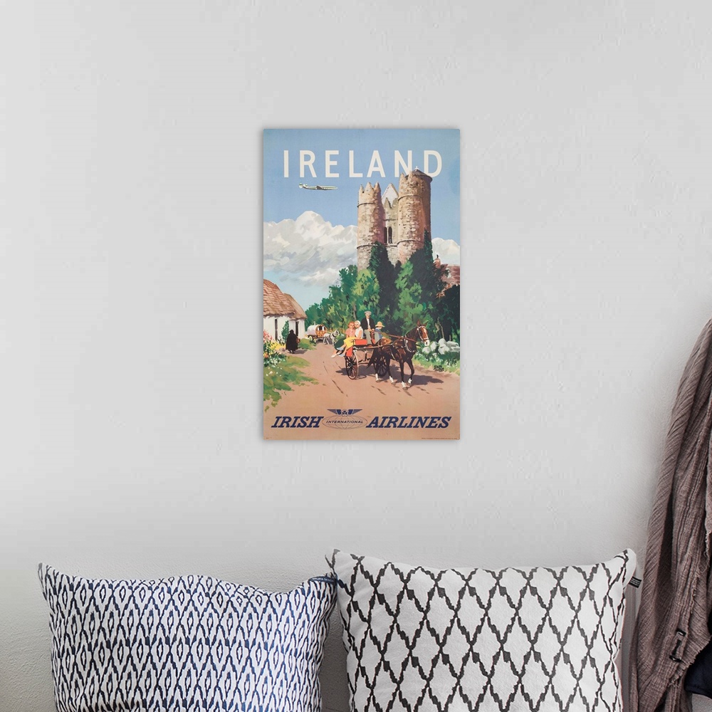 A bohemian room featuring Irish Airlines travelposter with tourists in horse wagon. Illustrated by Adolph Triedler