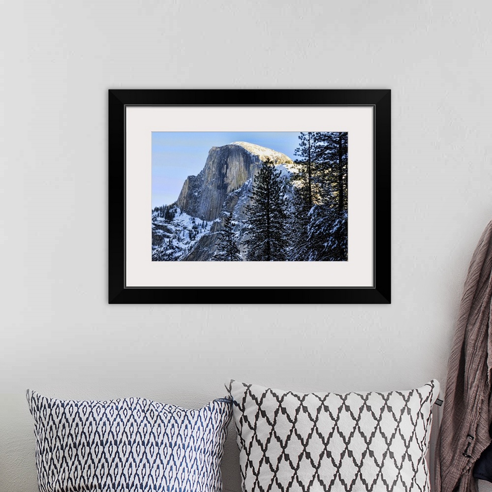 A bohemian room featuring Yosemite's Half Dome in winter. Yosemite national park is in California, USA.