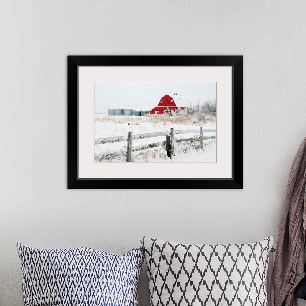 A bohemian room featuring Farm Yard With A Red Barn And Metal Grain Bins In Winter, Alberta, Canada