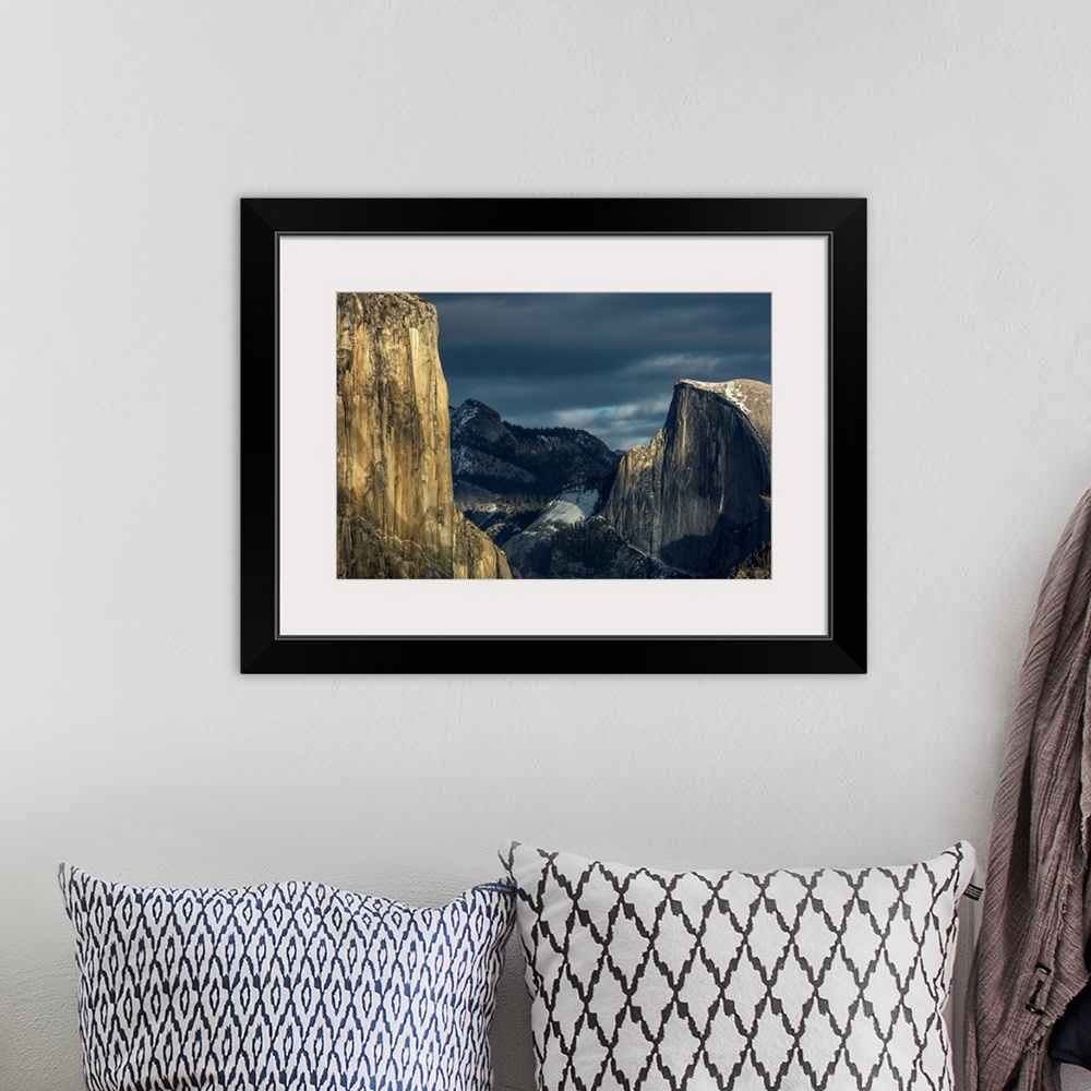A bohemian room featuring El Capitan and Half Dome in late afternoon winter light, as seen from Turtleback Dome in Yosemite...