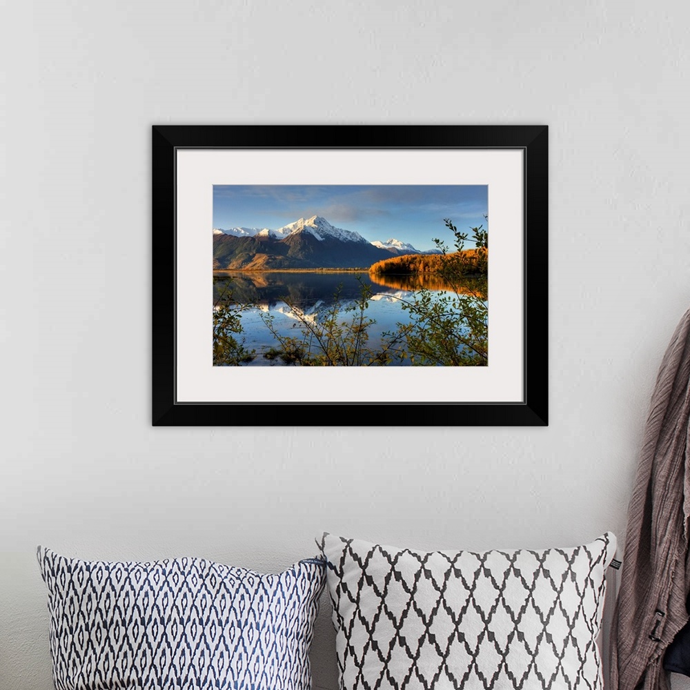 A bohemian room featuring Scenic view of Pioneer Peak reflecting in Jim Lake in Mat Su Valley, Alaska