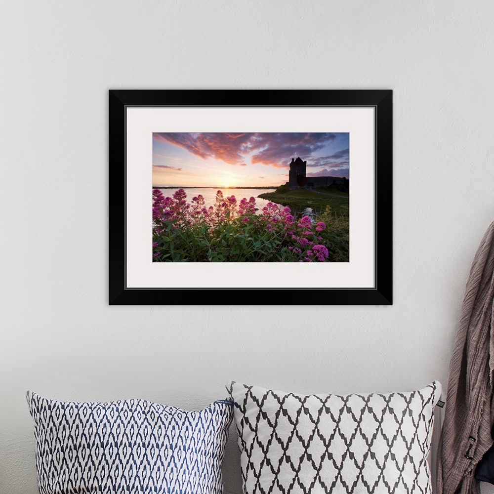 A bohemian room featuring Sunset Over Dunguaire Castle, Kinvara, County Galway, Ireland