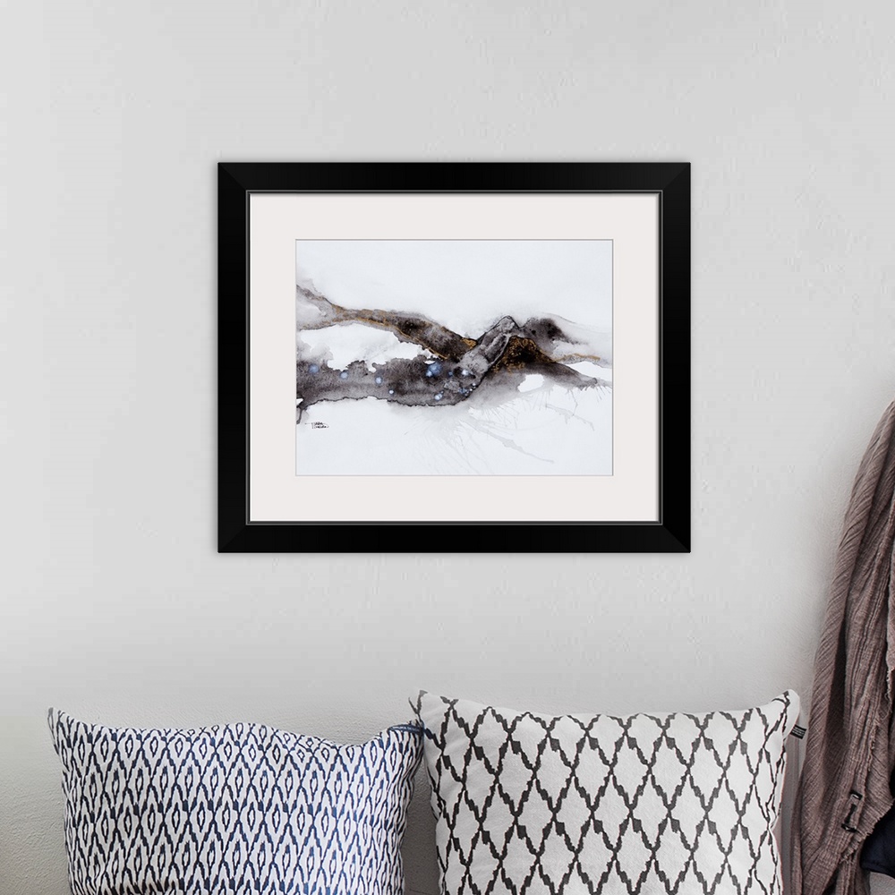 A bohemian room featuring Watercolour painting of an abstract black shape on a white background
