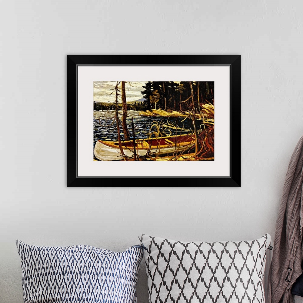A bohemian room featuring Big, landscape painting of an empty canoe banked against small trees along the shore.  A dense fo...