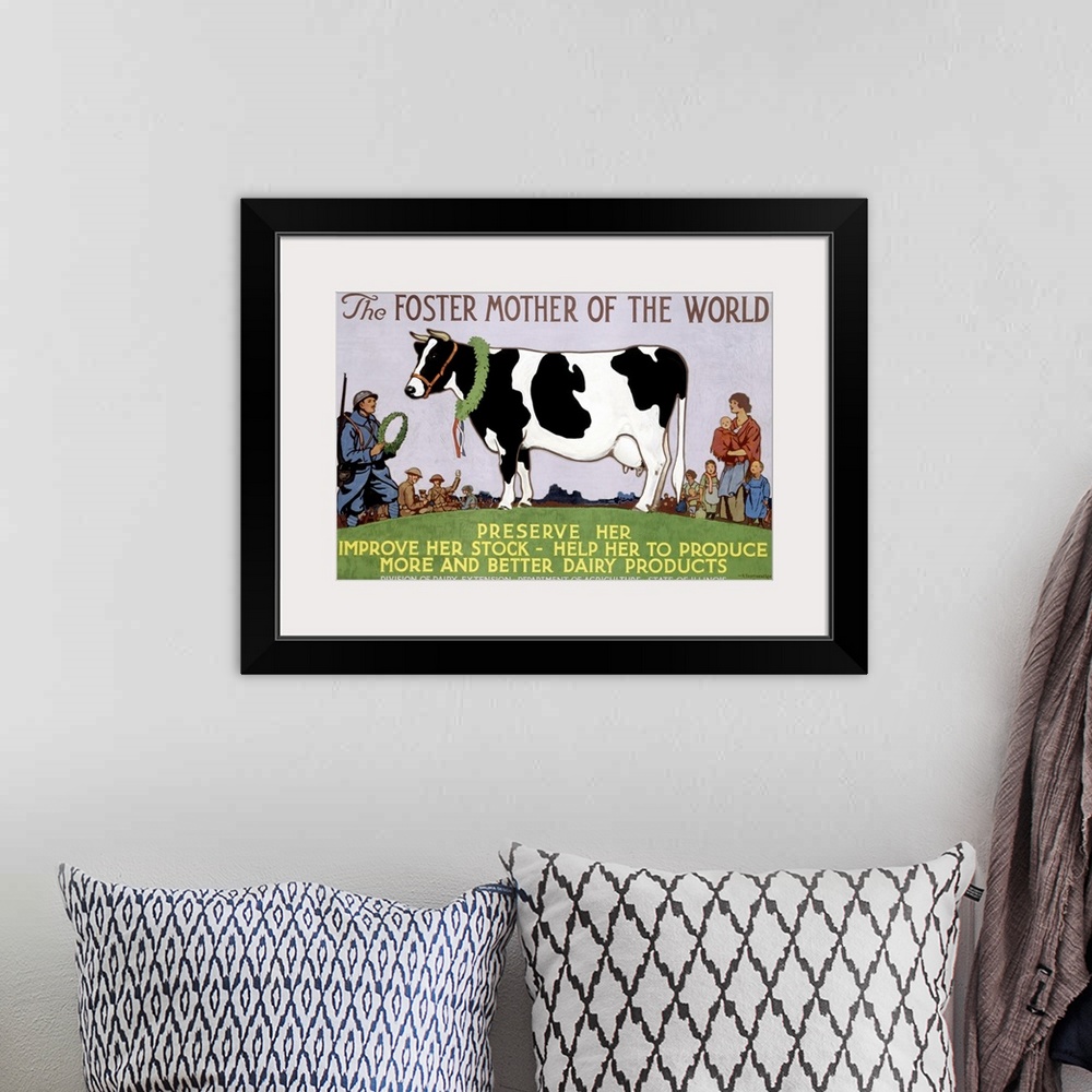 A bohemian room featuring Vintage poster that highlights a cow with people standing around her and about to crown her. The ...