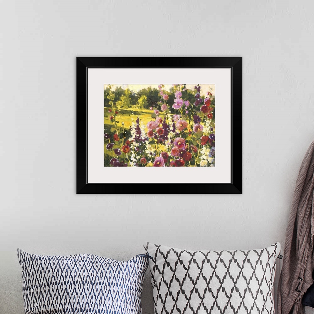 A bohemian room featuring Contemporary painting of a field of wildflowers looking out over a countryside meadow.
