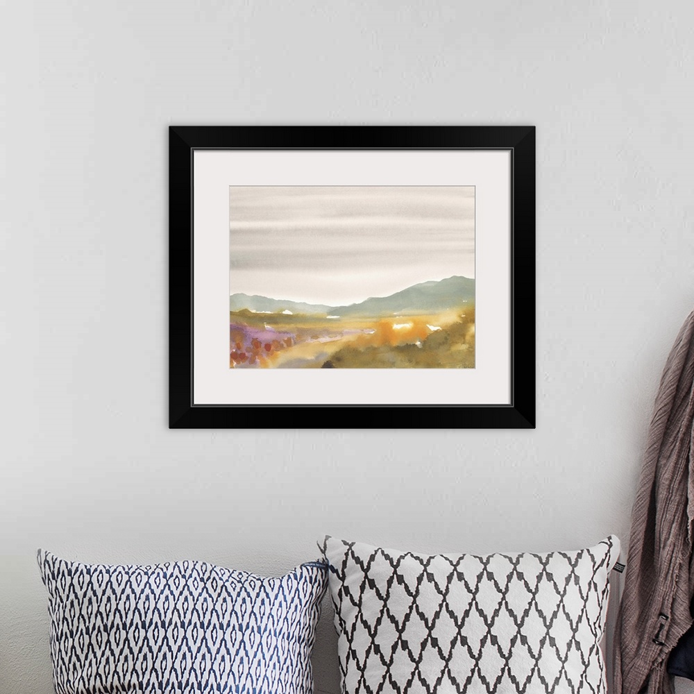 A bohemian room featuring Contemporary watercolor painting of a landscape.