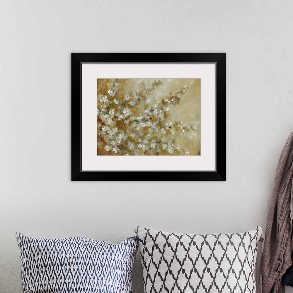 A bohemian room featuring Contemporary painting of a tree with branches full of white blossoms.