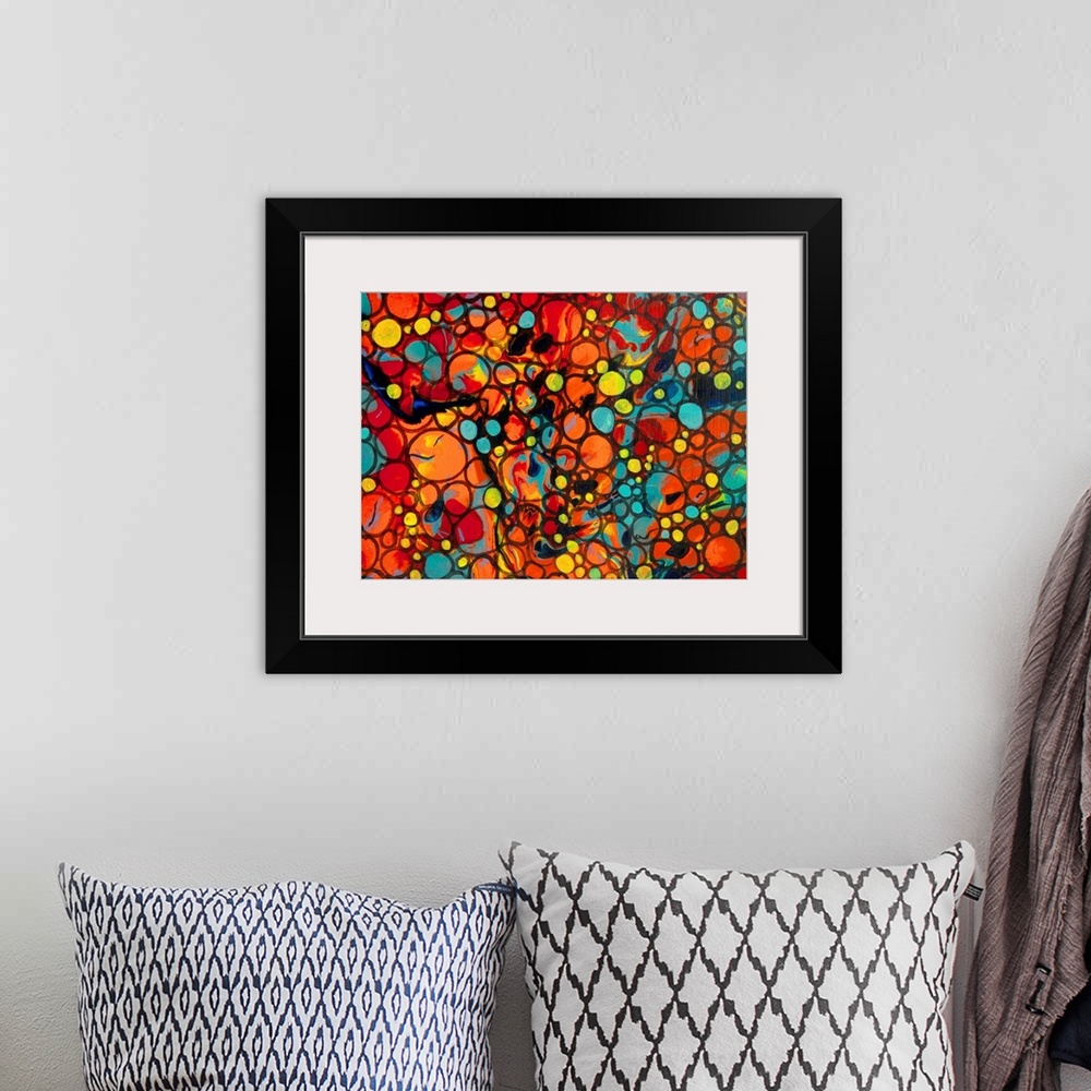 A bohemian room featuring A contemporary abstract painting of a saturated clustering of what resembles air bubbles with vib...