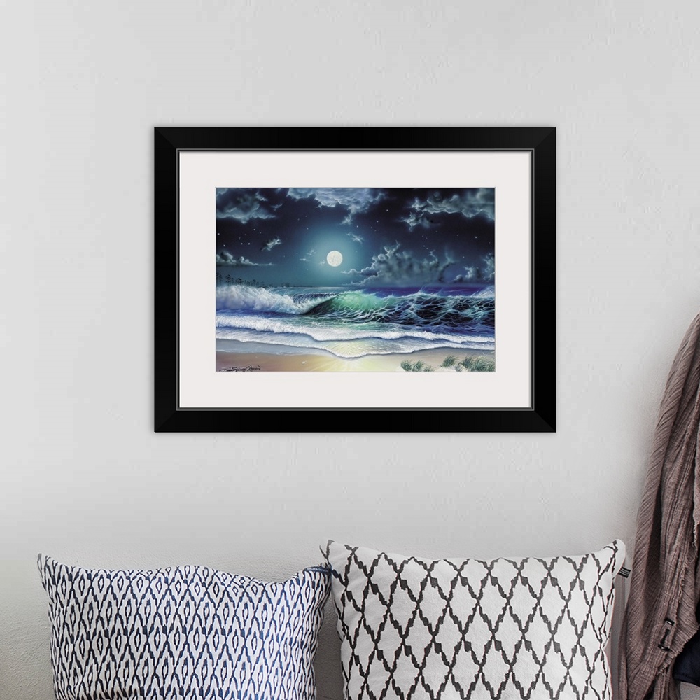 A bohemian room featuring Moon over the waves on the beach.
