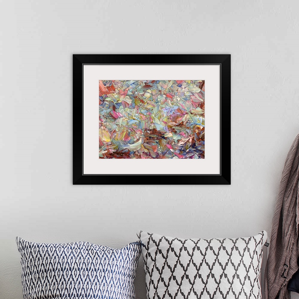 A bohemian room featuring Abstract artwork made of streaks and splatters.