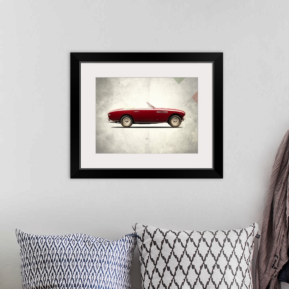 A bohemian room featuring Photograph of a red Ferrari 212 1951 printed on a distressed white and gray background with part ...