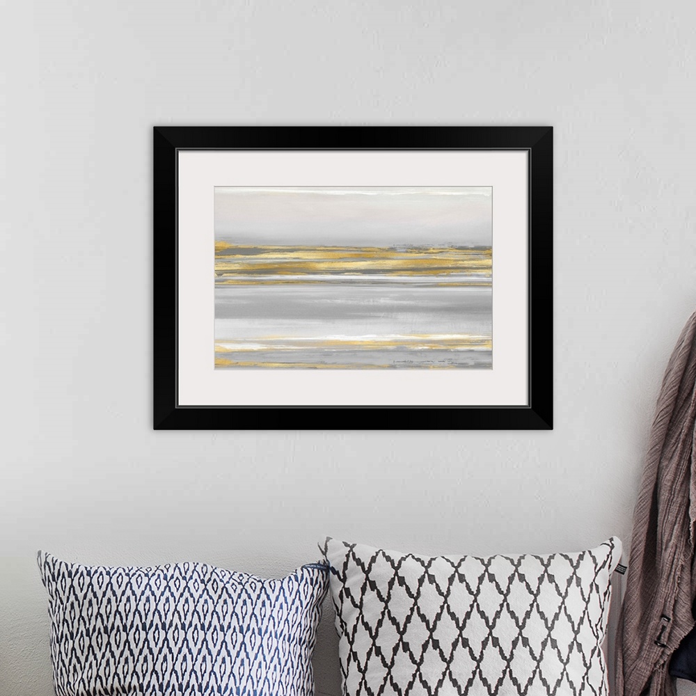 A bohemian room featuring Contemporary artwork featuring gold brush strokes on a soft gray background.