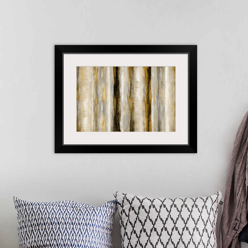 A bohemian room featuring Large abstract painting with bands of metallic gold and silver running vertically across the canv...