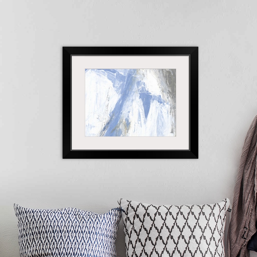 A bohemian room featuring A contemporary abstract painting using pale blue and white tones in bold aggressive strokes.