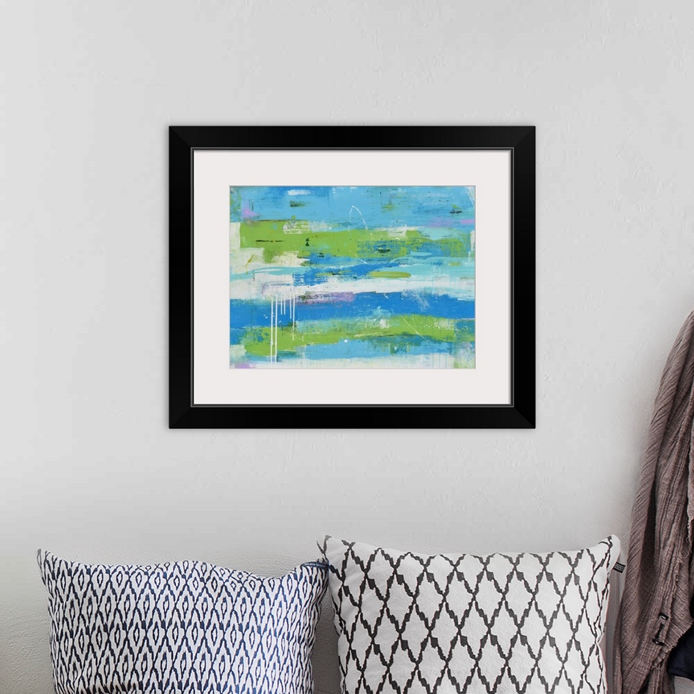 A bohemian room featuring Contemporary abstract painting using blues and greens in a horizontal swiping motion.