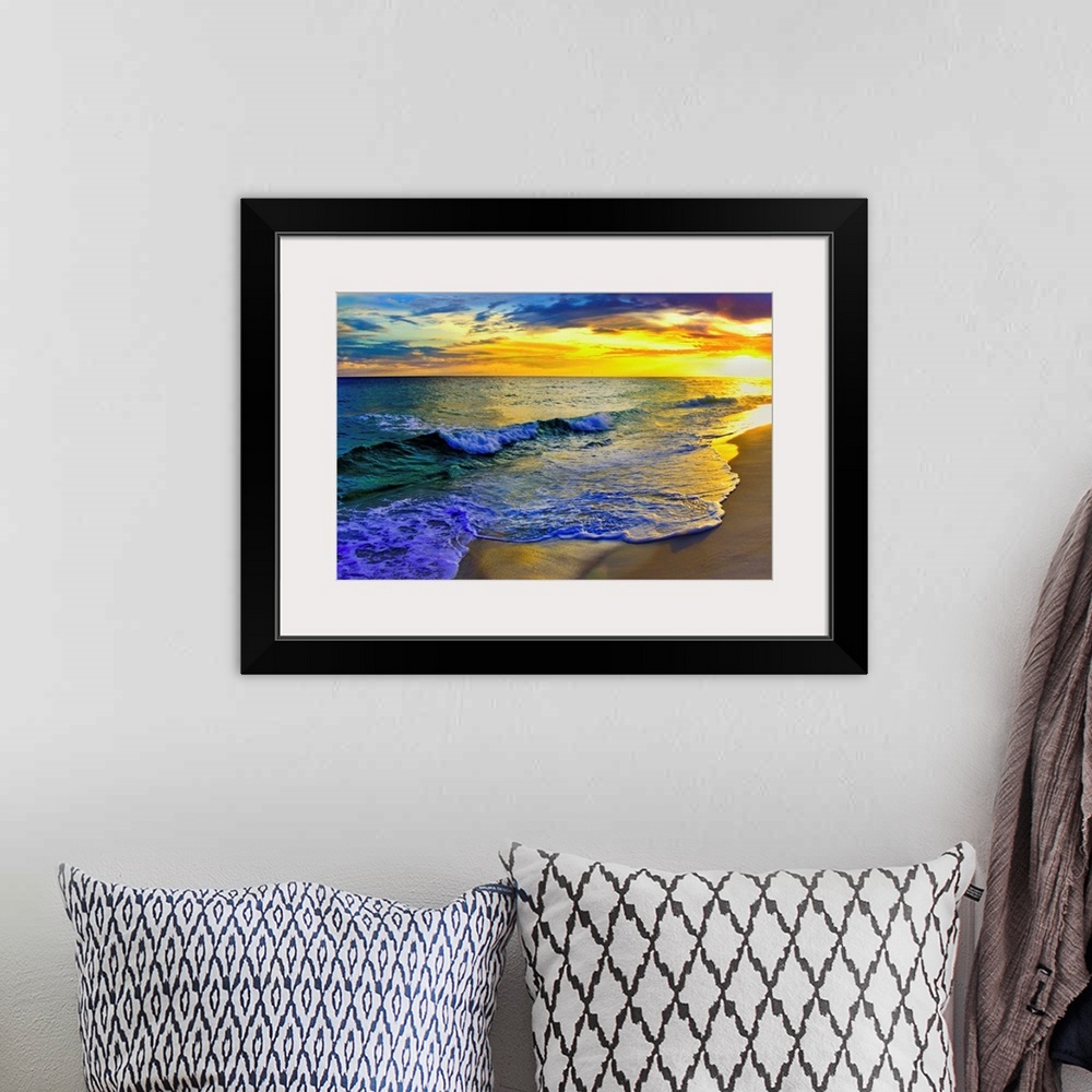 A bohemian room featuring Image of waves rolling over Navarre beach before a dark yellow sunset seascape. Landscape taken o...