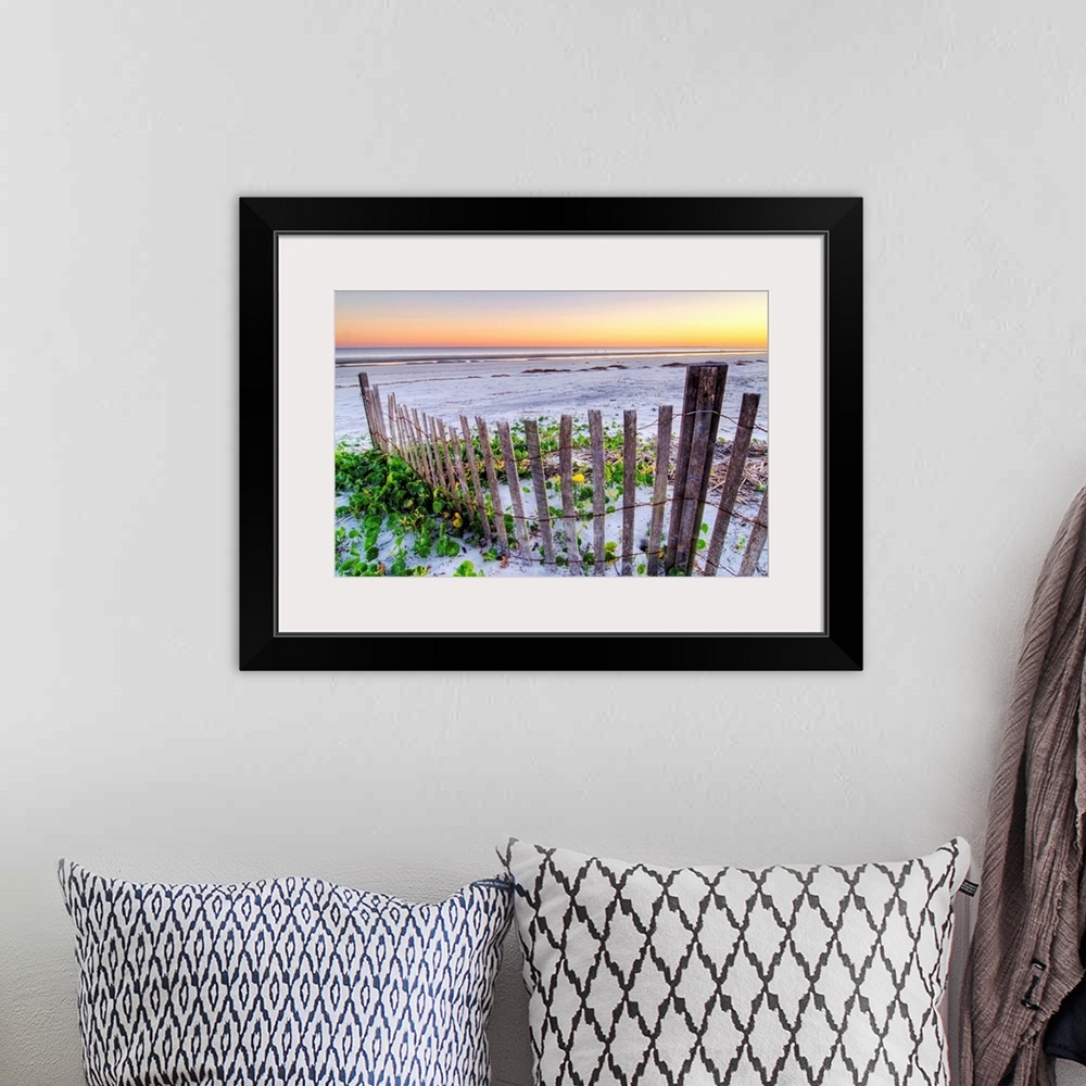 A bohemian room featuring Wall art for the home or office this landscape photograph is of a battered barrier fence ends on ...