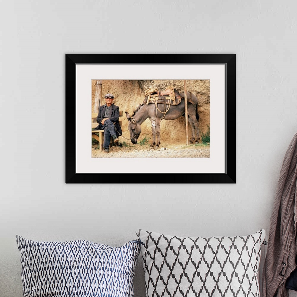 A bohemian room featuring Greece,Meteora,man with donkey