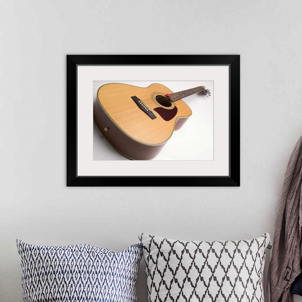 A bohemian room featuring Acoustic guitar