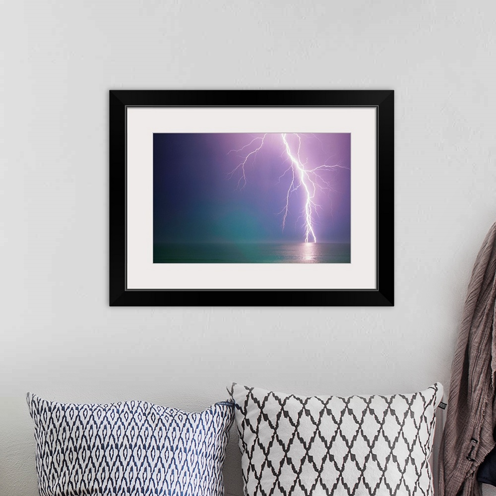 A bohemian room featuring Lightning Storm Over Ocean