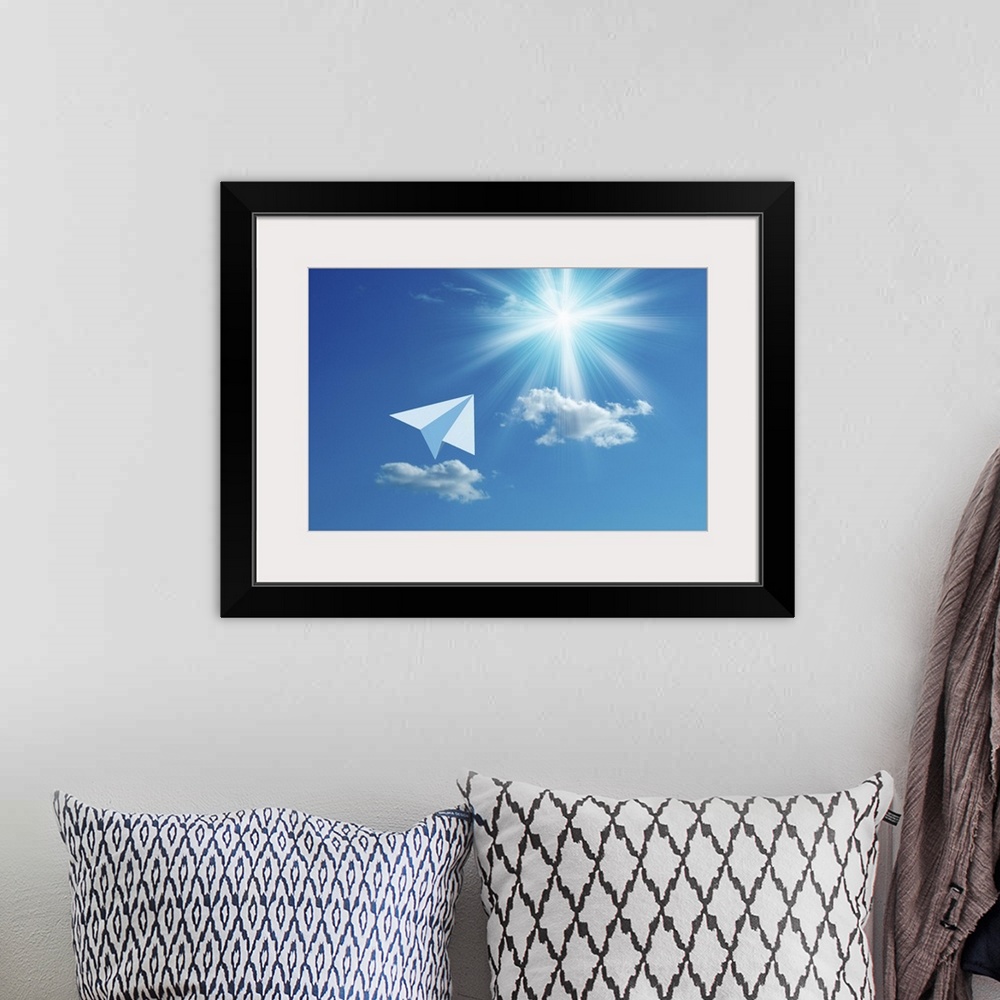 A bohemian room featuring Paper airplane flying towards the sun