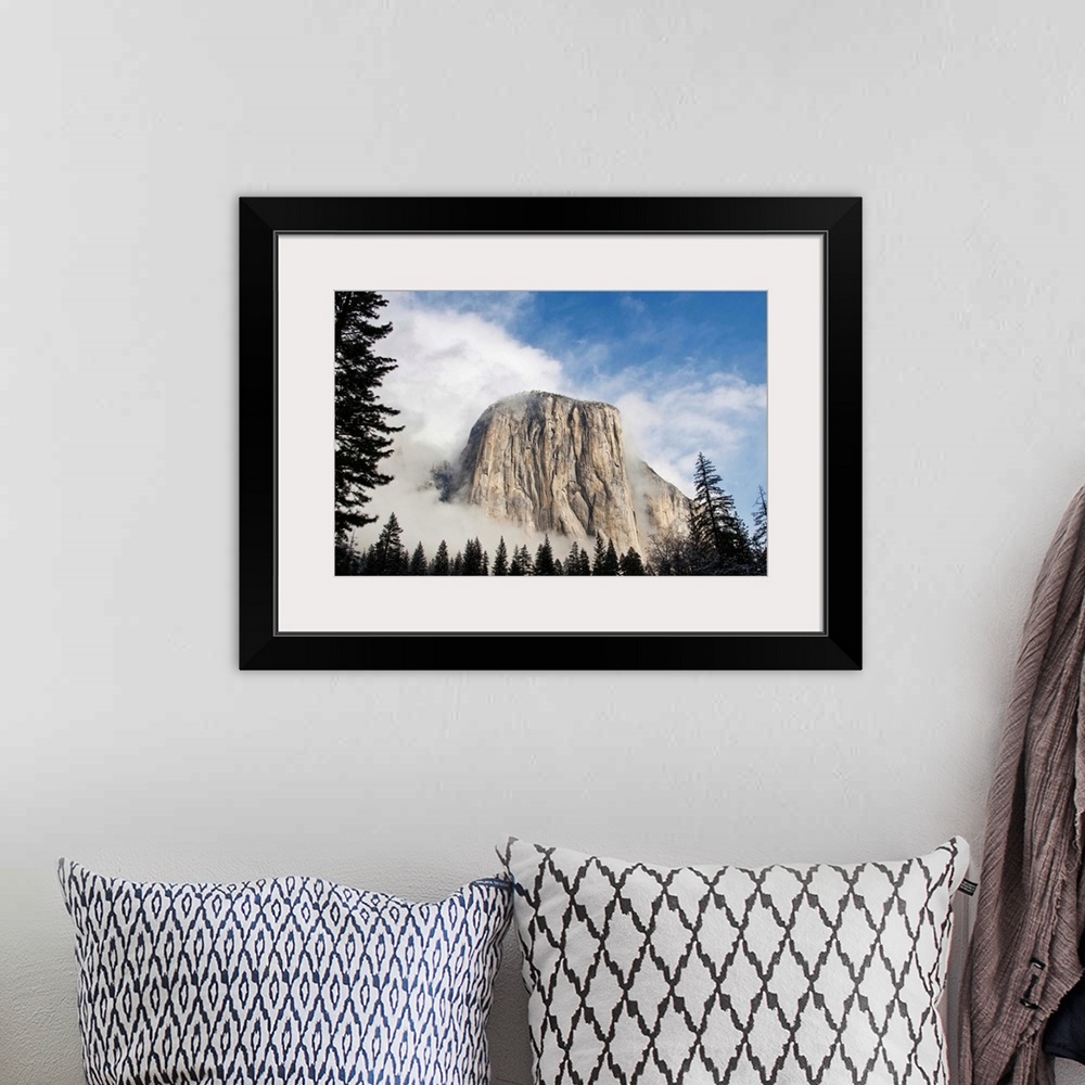A bohemian room featuring Yosemite in November El Capitan coming out of fog.