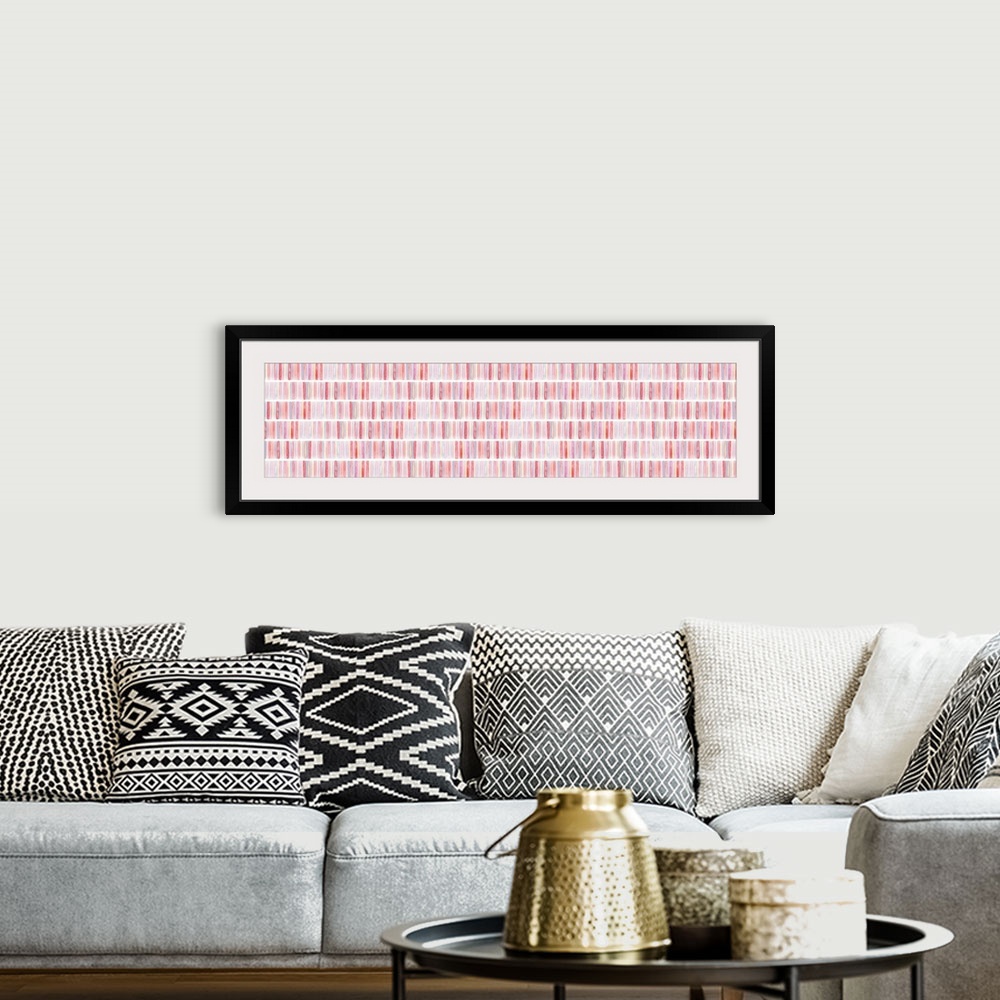 A bohemian room featuring Large panoramic abstract watercolor painting with geometric patterns in shades of red, pink, purp...