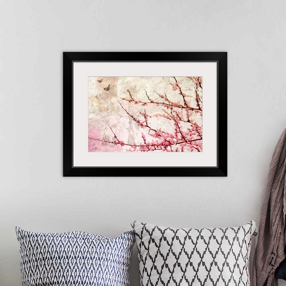 A bohemian room featuring Contemporary artwork of tree branches covered in flowers with crackled background and two small b...