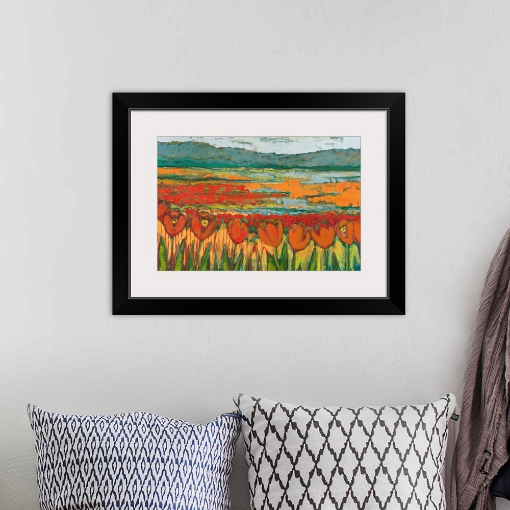 A bohemian room featuring A horizontal landscape painting with chunky brushstrokes of an abstract tulip field surrounded by...