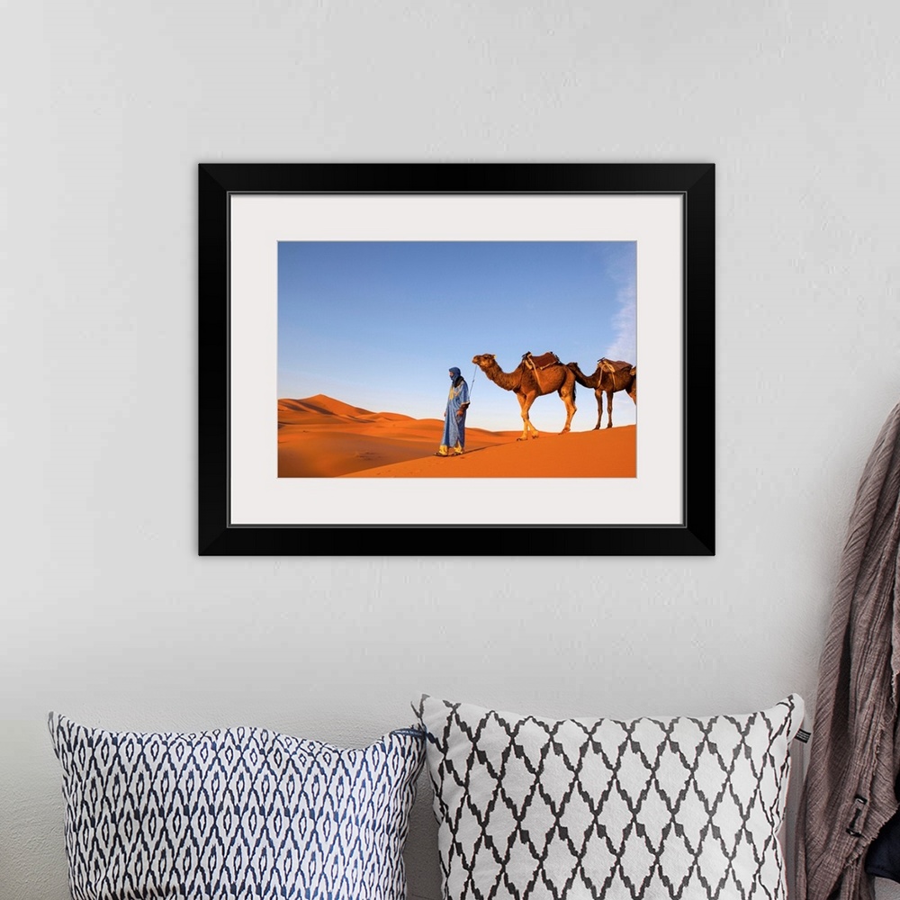 A bohemian room featuring Camel Driver, Sahara Desert, Merzouga, Morocco, (MR)