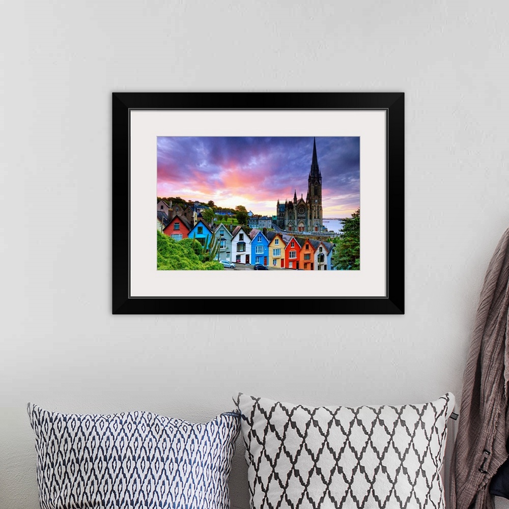 A bohemian room featuring Europe, Ireland, Cork, Cobh Cathedral at colored houses at sunrise