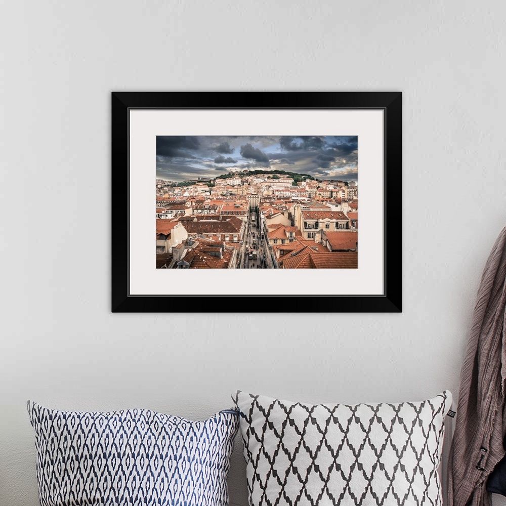 A bohemian room featuring Portugal, Lisbon, rooftop view of Baixa District with Sao Jorge Castle and Alfama District beyond