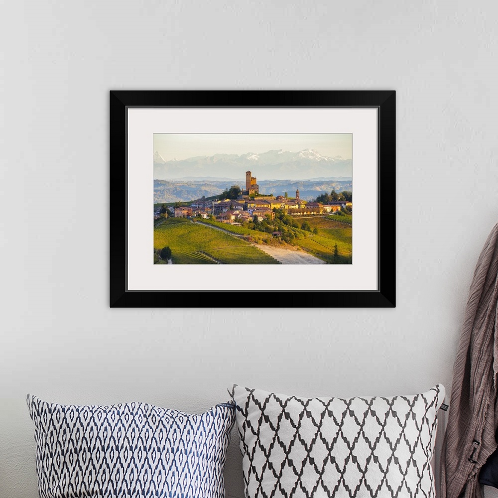 A bohemian room featuring The vineyards of Serralunga d'Alba and Alps in background during autumn sunrise, Serralunga d'Alb...