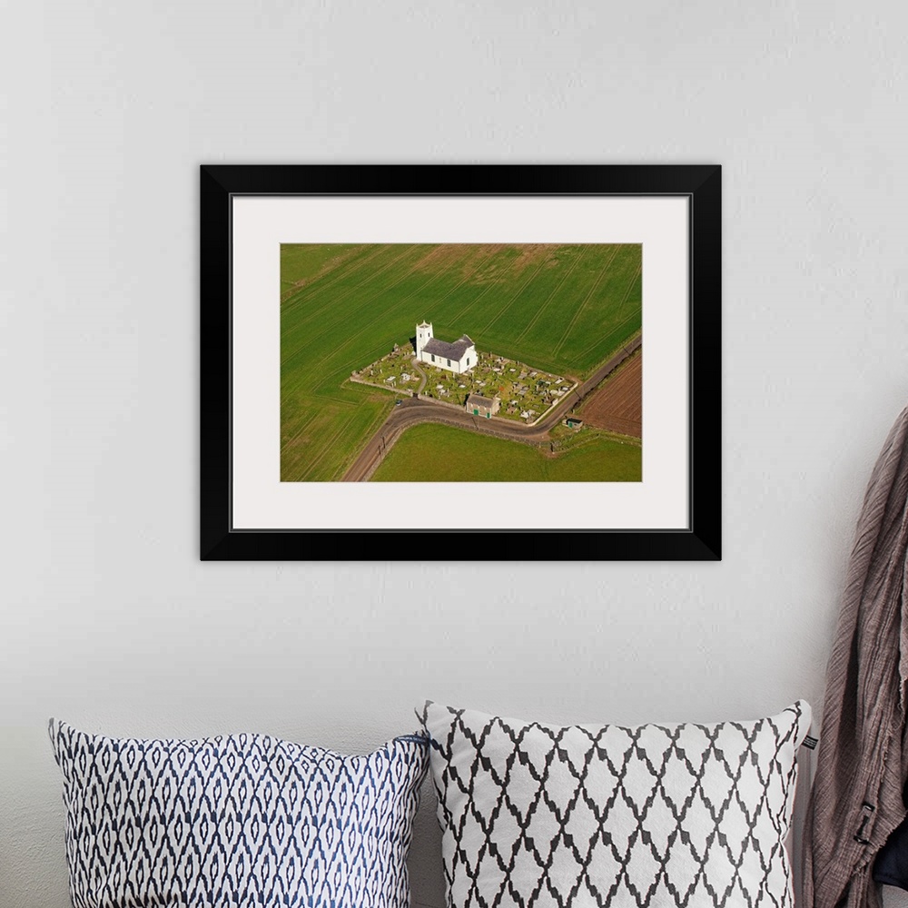A bohemian room featuring Ballintoy Parish Church, Bushmills, Northern Ireland - Aerial Photograph