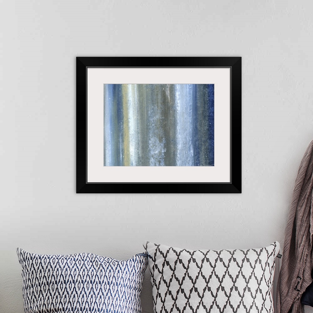 A bohemian room featuring A contemporary abstract painting that has vertical lines of different shades of blue, green, whit...